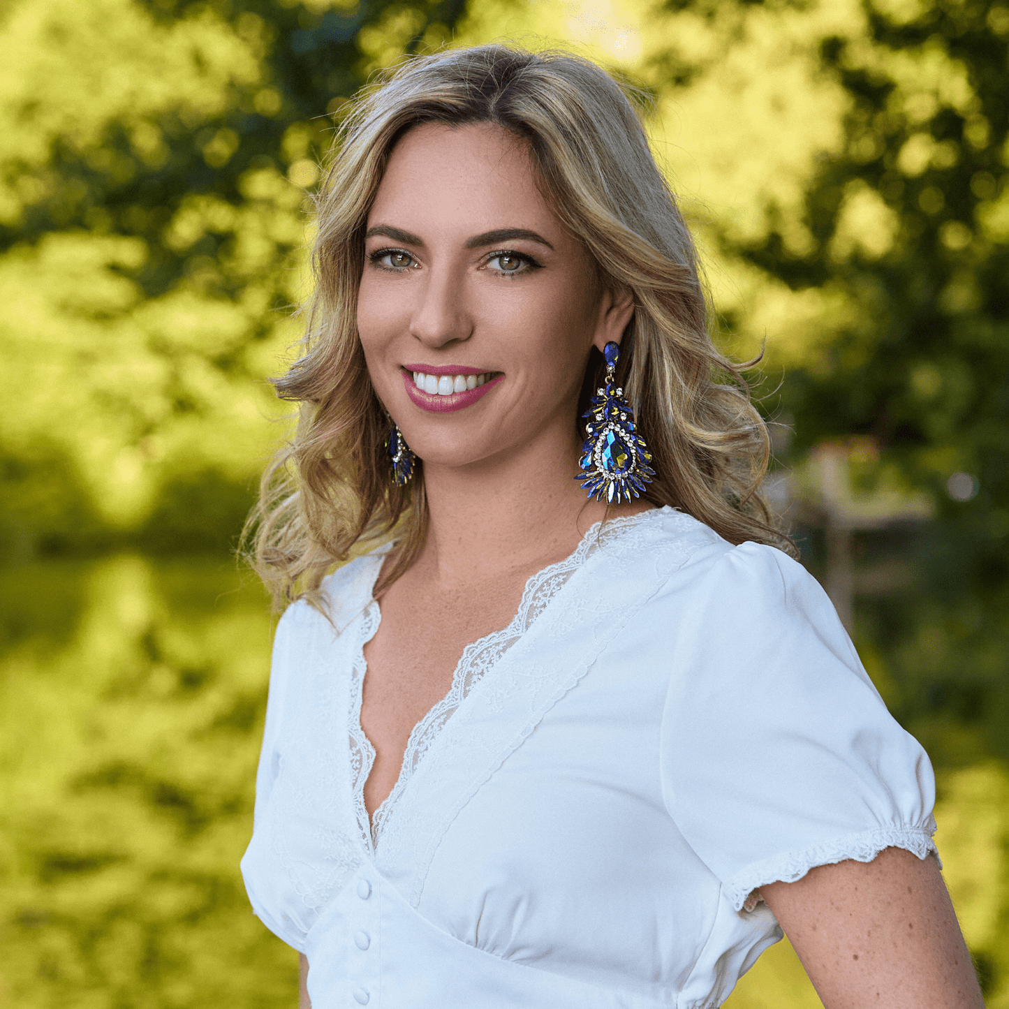 Photo modele boucles d'oreilles pendantes paon