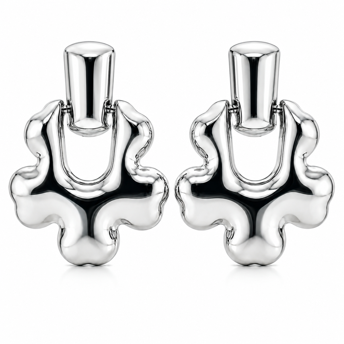 Boucles d'oreilles pendantes Speculo en acier inoxydable, design fluide argenté avec finition brillante