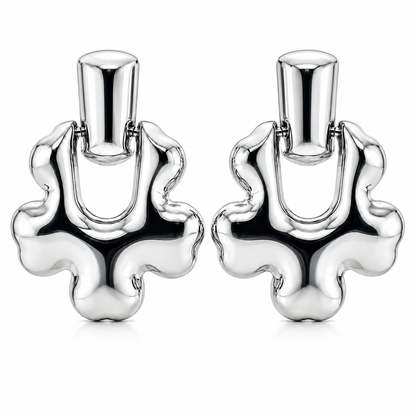 Boucles d'oreilles pendantes Speculo en acier inoxydable, design fluide argenté avec finition brillante