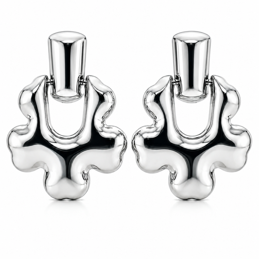 Boucles d'oreilles pendantes Speculo en acier inoxydable, design fluide argenté avec finition brillante