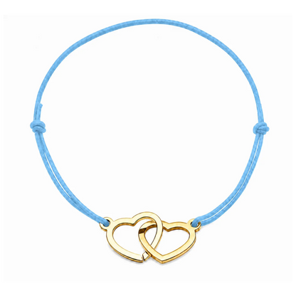 Bracelet cœur en acier doré avec cordon bleu clair ajustable, bijou personnalisable élégant fabriqué en France par Les Inséparables.