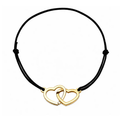 Bracelet cœur en acier doré avec cordon noir ajustable, bijou personnalisable élégant fabriqué en France par Les Inséparables.