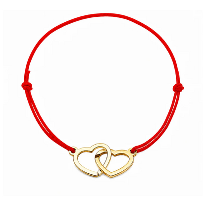 Bracelet cœur en acier doré avec cordon rouge ajustable, bijou personnalisable élégant fabriqué en France par Les Inséparables.