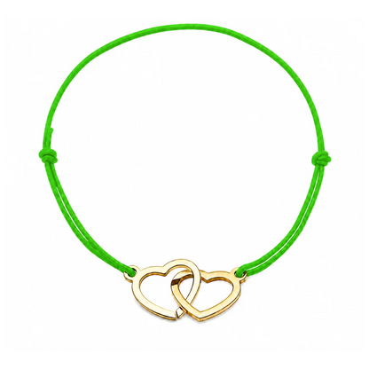 Bracelet cœur en acier doré avec cordon vert pomme ajustable, bijou personnalisable élégant fabriqué en France par Les Inséparables.