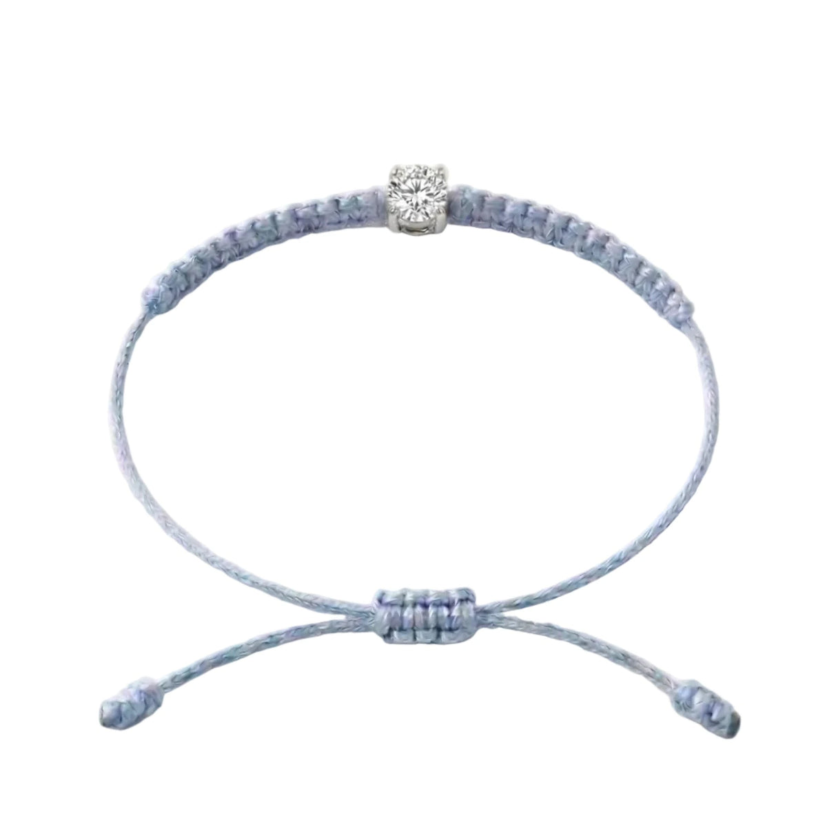 Bracelet cordon bleu ciel, pierre de diamant de laboratoire sertie sur or
750/1000, fermoir coulissant réglable
