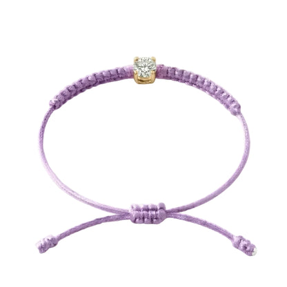 Bracelet cordon parme, pierre de diamant de laboratoire sertie sur or 750/1000,
fermoir coulissant réglable