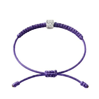 Bracelet cordon violet, pierre de diamant de laboratoire sertie sur or 750/1000,
fermoir coulissant réglable
