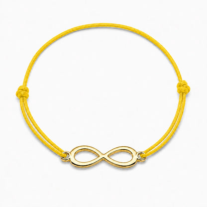 Bracelet infini doré avec cordon jaune, vue de face