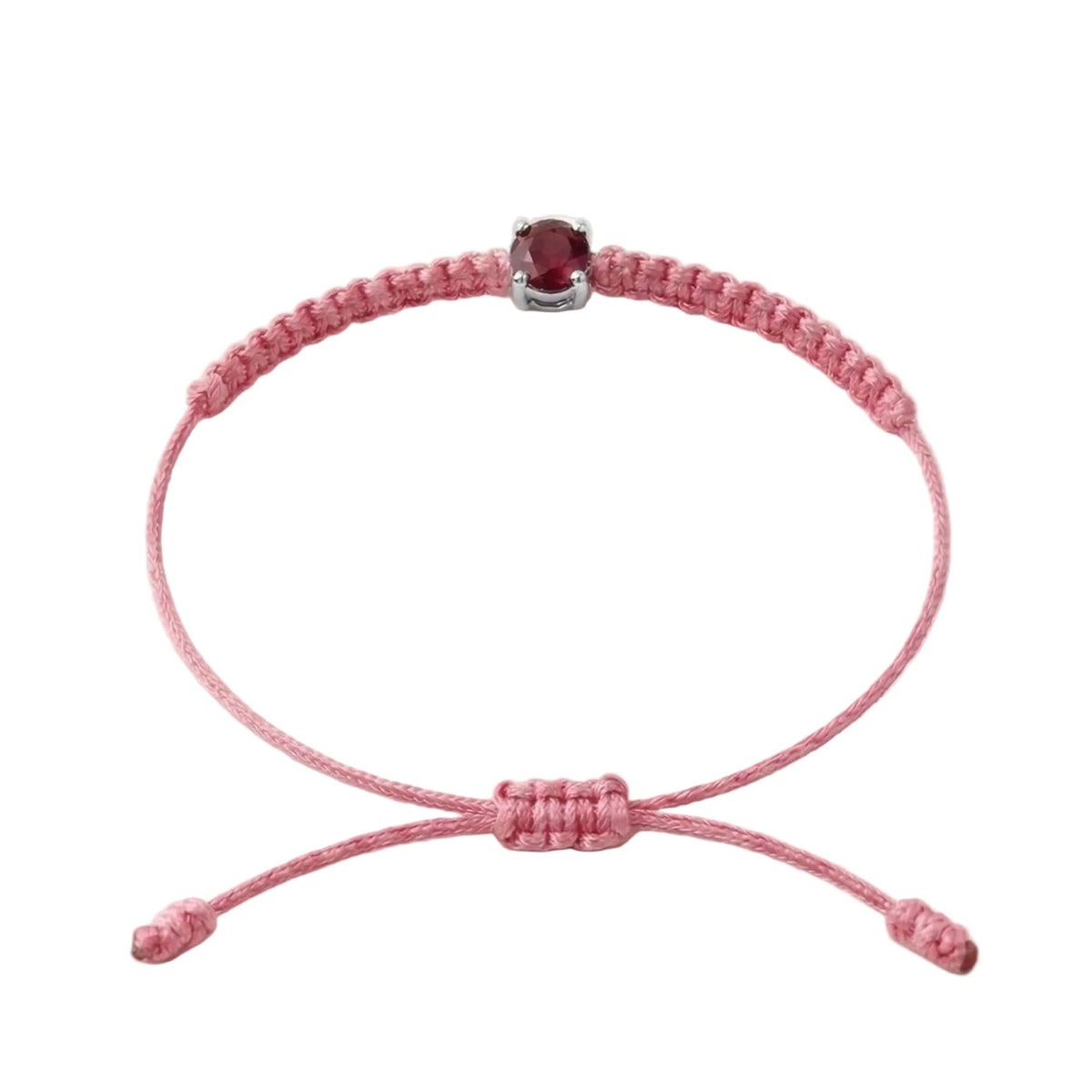 Bracelet cordon rose, pierre de rubis rouge de laboratoire sertie sur or
750/1000, fermoir coulissant réglable
