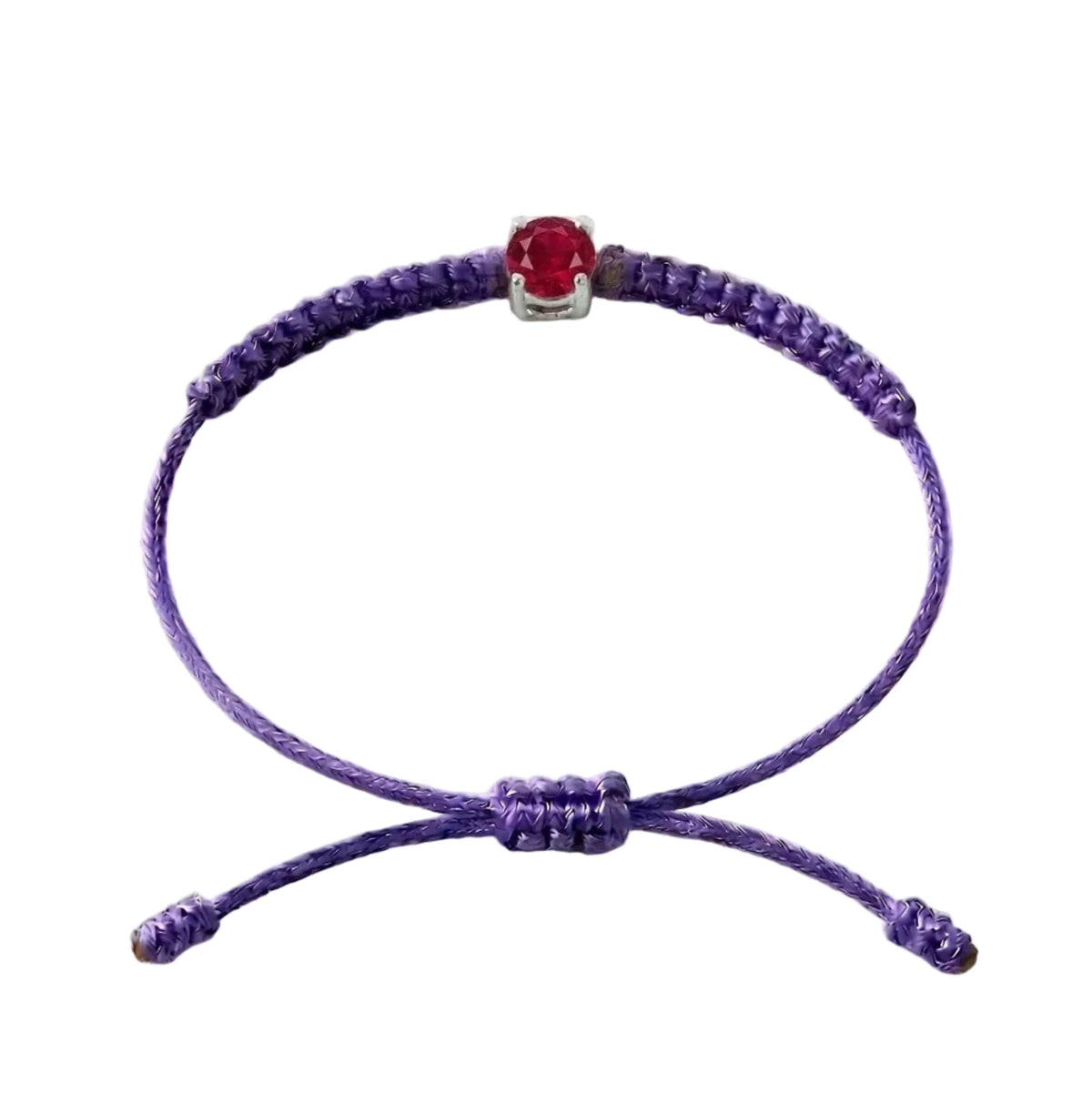 Bracelet cordon violet, pierre de rubis rouge de laboratoire sertie sur or
750/1000, fermoir coulissant réglable

