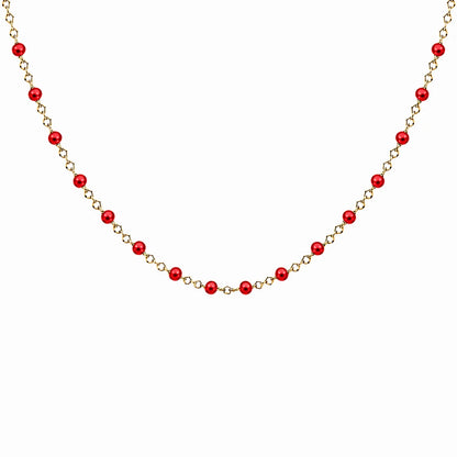 Collier chaîne fine en acier inoxydable dorée avec petites perles de résine rouges