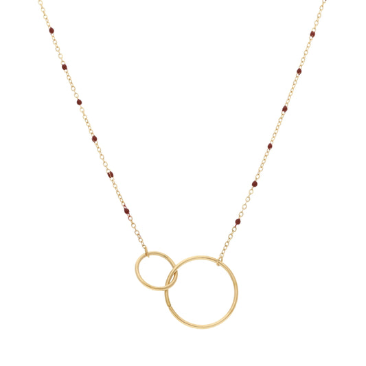 Collier double cercle doré avec perles rouges, vue de face
