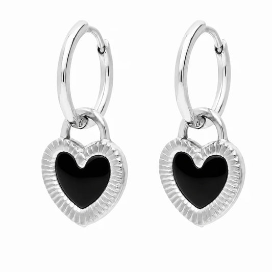 Boucles d’oreilles créoles réversibles argentées en acier inoxydable – côté cœur noir
