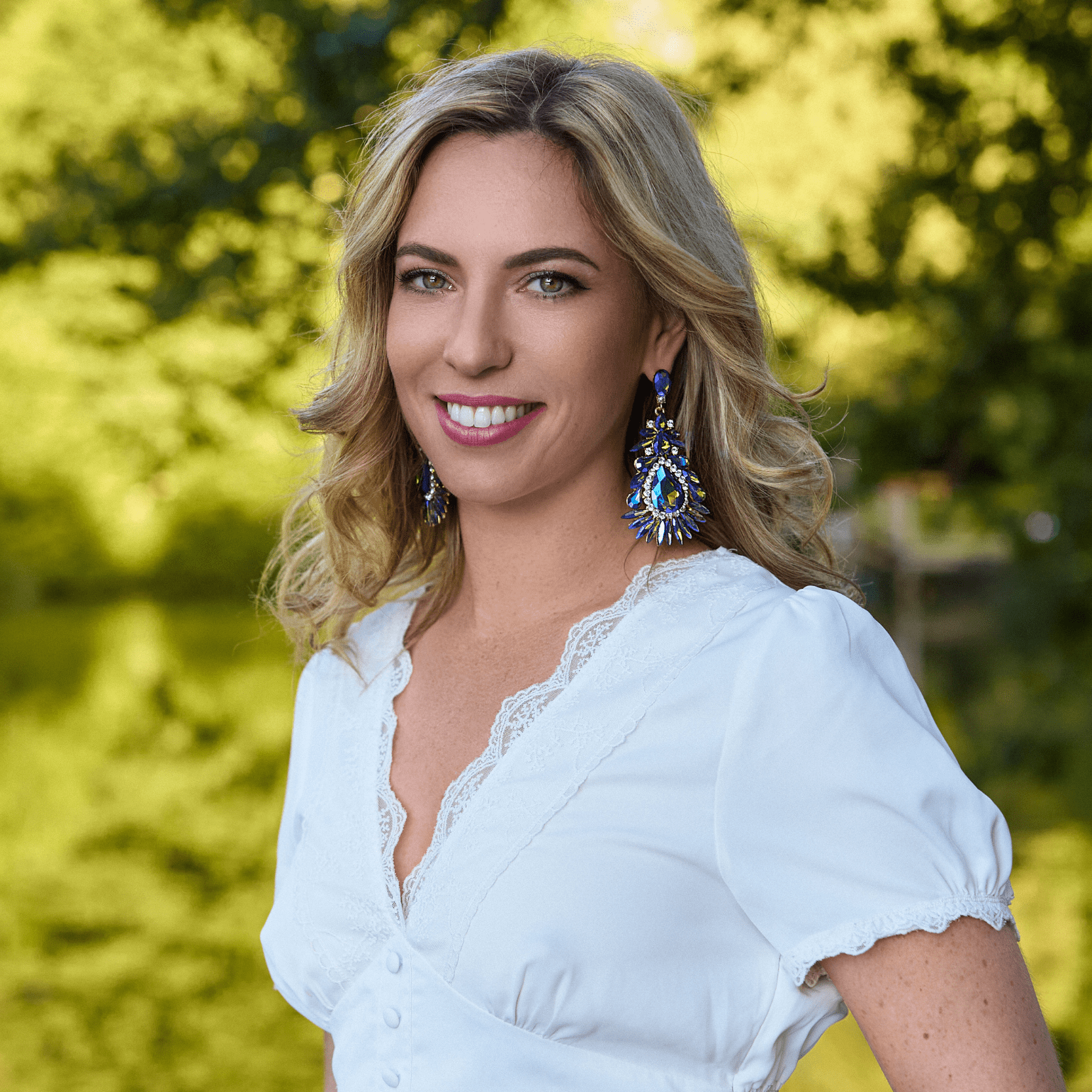 Photo modele boucles d'oreilles pendantes paon 